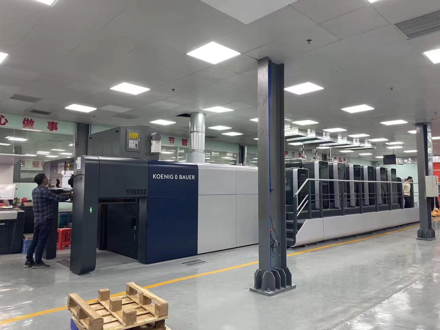 Large-format printing equipment in a stationery production facility